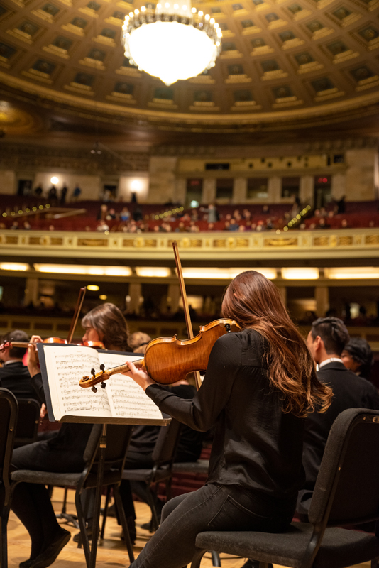 Violin student on Kodak Hall stage. Violin student on Kodak Hall stage.
